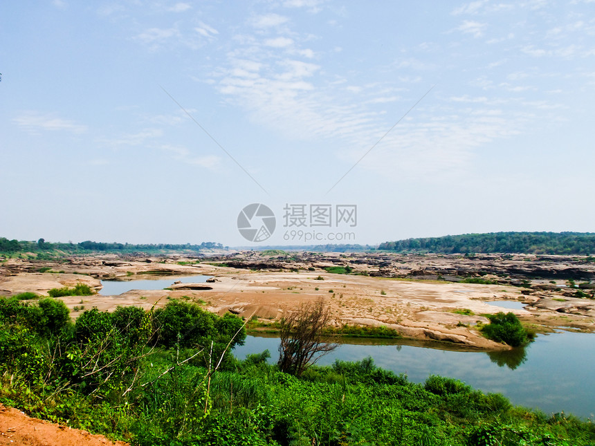 大峡谷 湄公河 Tha场景蓝色河岸天空河道河床石头旅行峡谷热带图片
