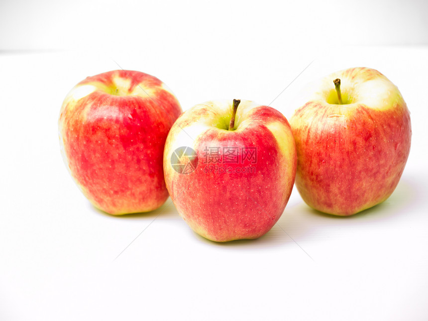 白色背景上孤立的红苹果水果饮食食物植物茶点红色营养团体图片