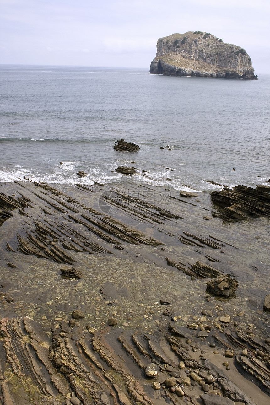 圣胡安德加兹特鲁加特地区海洋海滩海岸线石头海岸港口隐士岩石银行图片