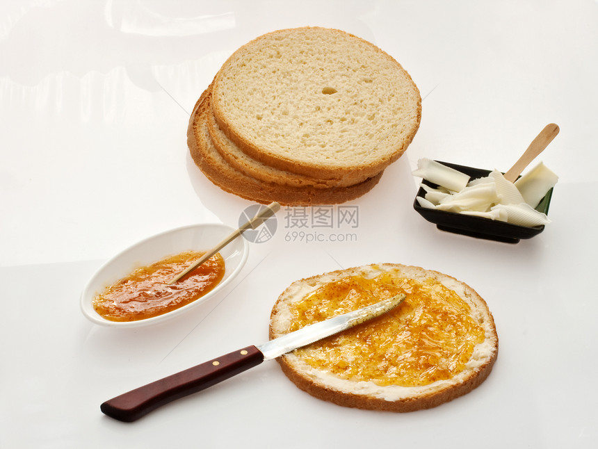 与黄油和果酱面包早餐面粉活力精力饮食食物饥饿飞碟营养图片