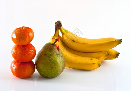 癸烷德卡纳梨 橘子和香蕉叶柄食物情调奇异果蔬菜果汁饥饿时间早餐精力背景