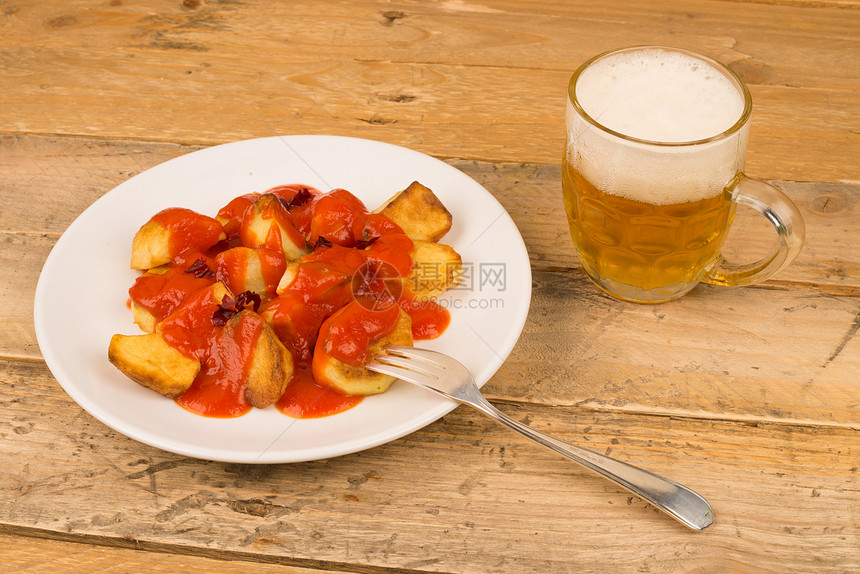 西班牙语拉塔语啤酒小吃服务美食盘子辣味水平食物乡村马铃薯图片