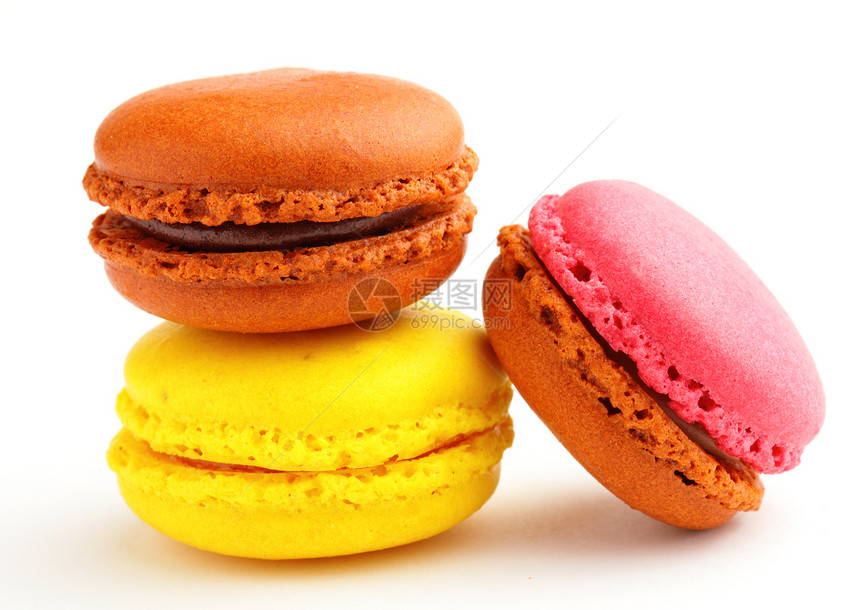 色彩多彩的马卡龙黄色甜点美食小吃粉色味道饼干糖果白色橙子图片
