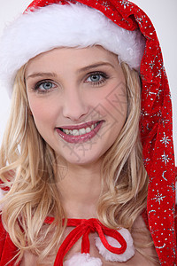 戴圣诞老人帽子的女人女士口红女孩魅力嘴唇发型睫毛宝贝化妆品白色背景图片