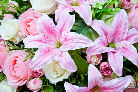 人工花丝绸织物粉色树叶植物群花束植物玫瑰背景图片