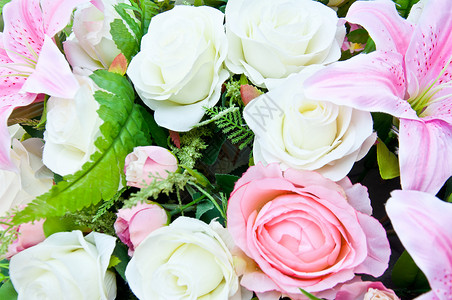人工花树叶粉色玫瑰织物丝绸植物花束植物群背景图片