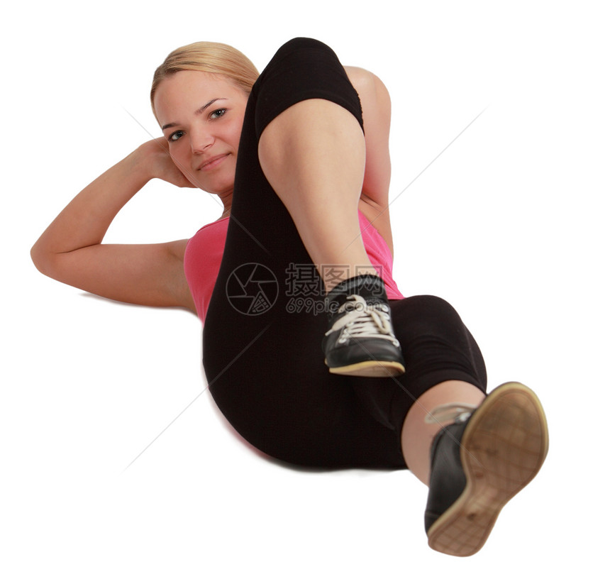 妇女坐立女金发女郎锻炼女性化训练青少年女孩成人体操健身房女性图片