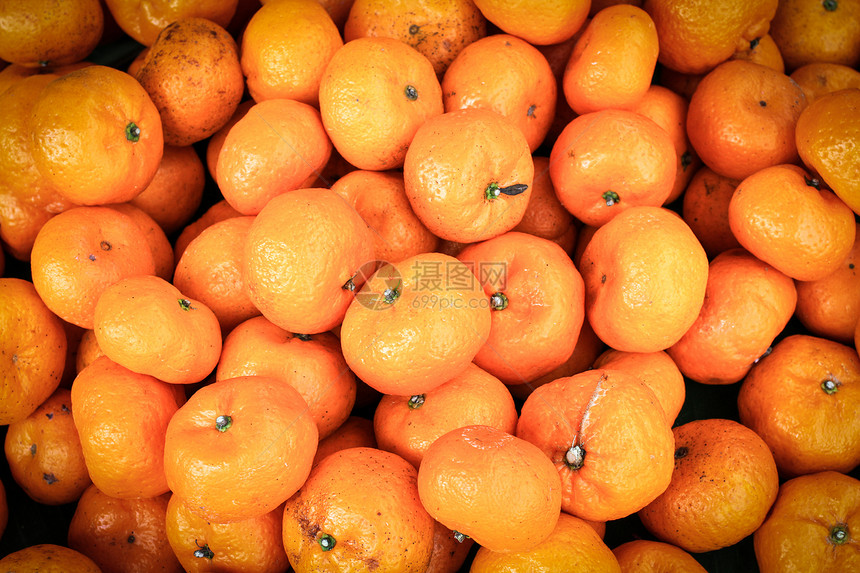 市场中的橙色水果街道橙子黄色图片
