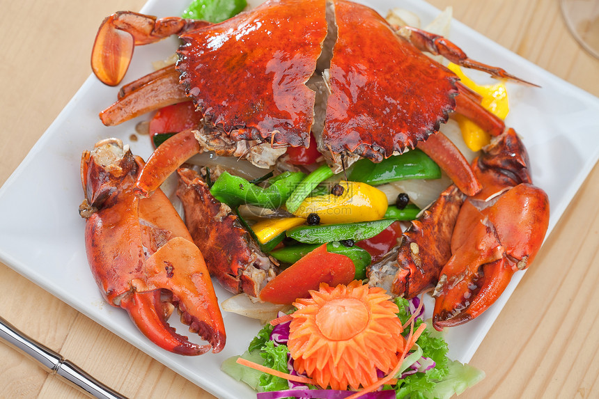 以彩色为背面颜色的新鲜鲜菜螃蟹健康海鲜食物美食盘子营养午餐餐厅环境图片