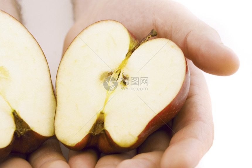 半个苹果在白色上被孤立早餐小吃食物红色水果液体美食果汁图片