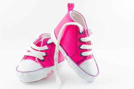 粉红婴儿鞋运动鞋运动粉色婴儿女孩蕾丝鞋类衣服孩子背景图片