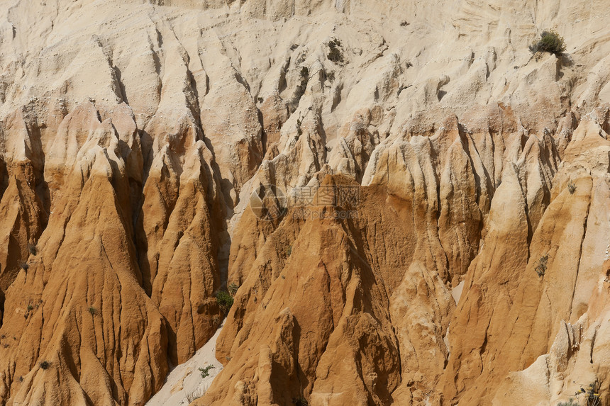 沙石悬崖侵蚀编队风景砂岩海岸崎岖图层黄色石头图片