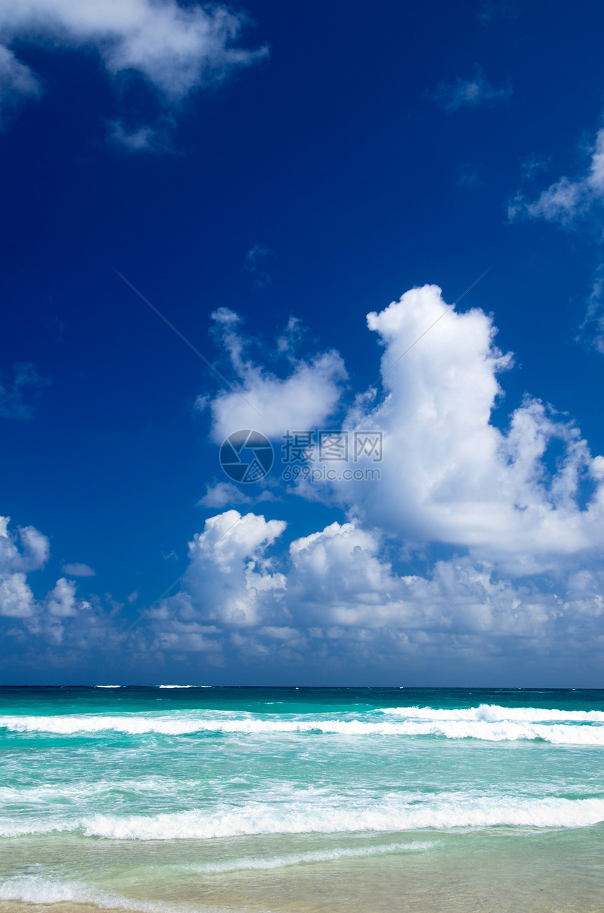 热带海洋阳光太阳场景旅行棕榈海浪风景日落蓝色地平线图片