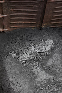 煤粉商品石墨灰色煤炭工业运输进口地面出口黑色背景图片