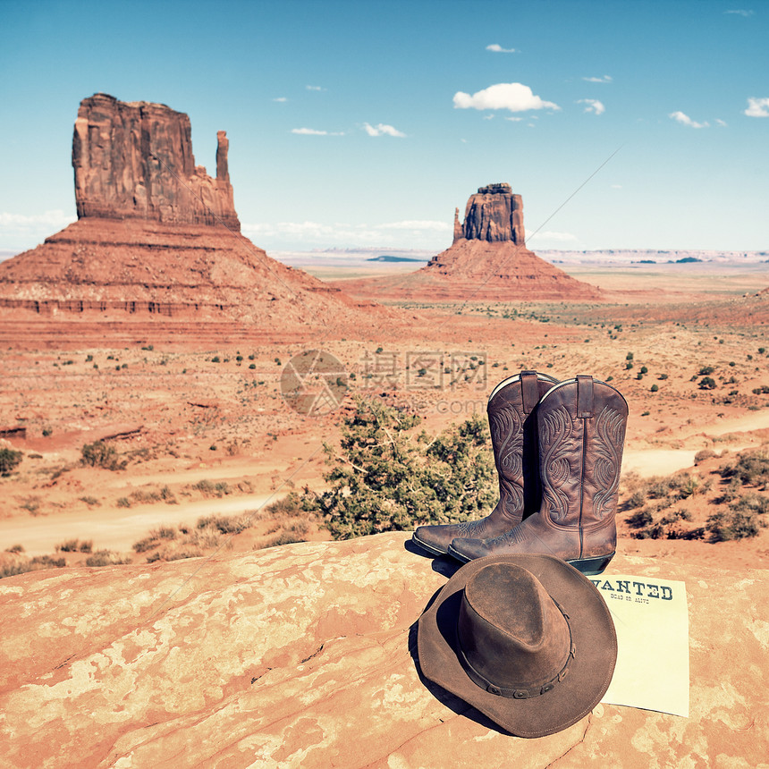 古迹谷的靴子和帽子黑色皮革崎岖国家稻草干草牛仔乡村棕色绳索图片