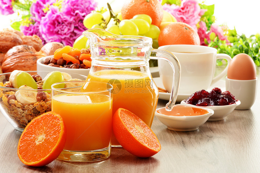 早餐 包括咖啡 面包 蜂蜜 橙汁 梅斯利a种子盘子厨房橙子果汁坚果餐厅饮食杯子桌子图片