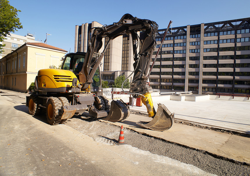 挖掘机街道堆肥土地建造巨石矿业轮胎司机拆除图片