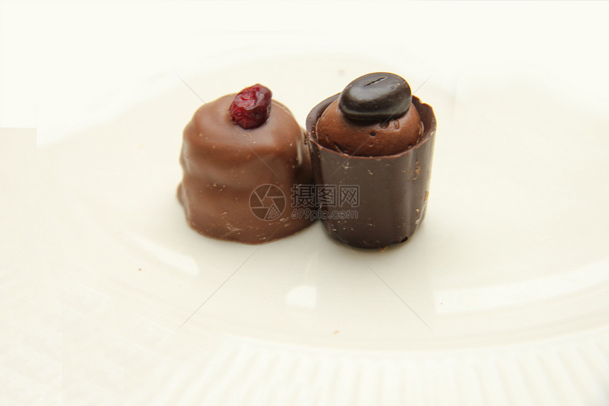 美味巧克力收藏装饰白色礼物糖果水果坚果甜点奢华棕色图片