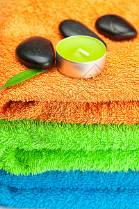 三条多色浴巾 黑色SPA STO的背景背景场景卫生沉思烛光诱惑福利团体叶子治疗药品背景图片