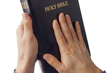 人类手中的神圣圣经背景图片