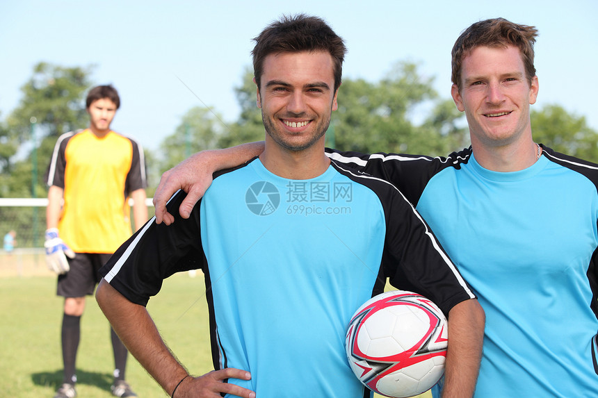足球运动员工具蓝色团队活动黄色守门员沥青闲暇娱乐运动图片