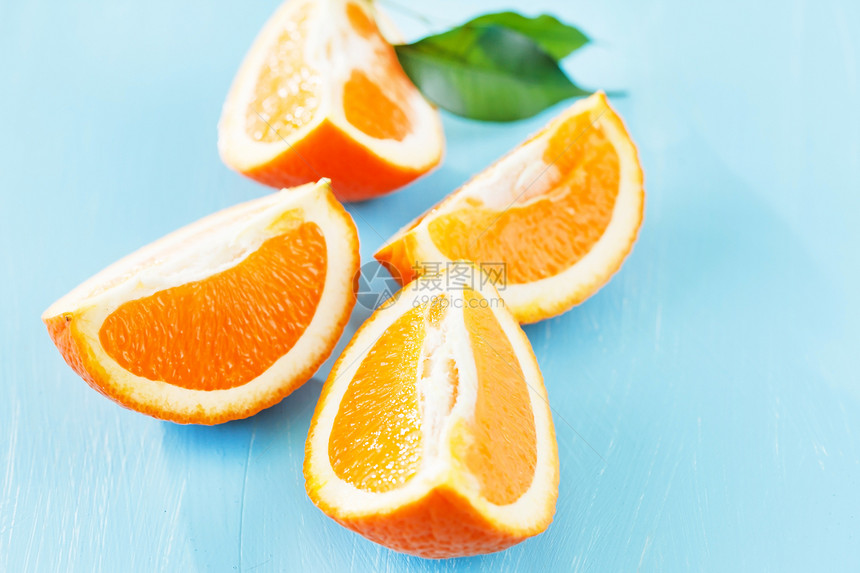 新鲜橙色甜食小吃水果健康饮食素食橙子热带饮食树叶养分图片