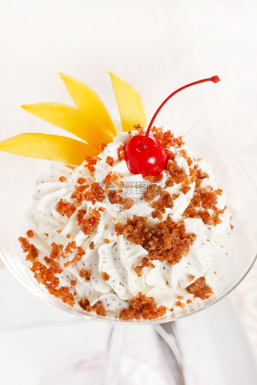 美味甜点巧克力白色傻事冰淇淋软糖奶制品橙子反射鞭子饮食图片