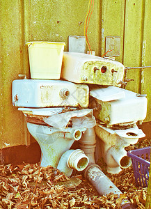 垃圾堆场倾倒洗手间废料废料场制品浴室院子陶瓷背景