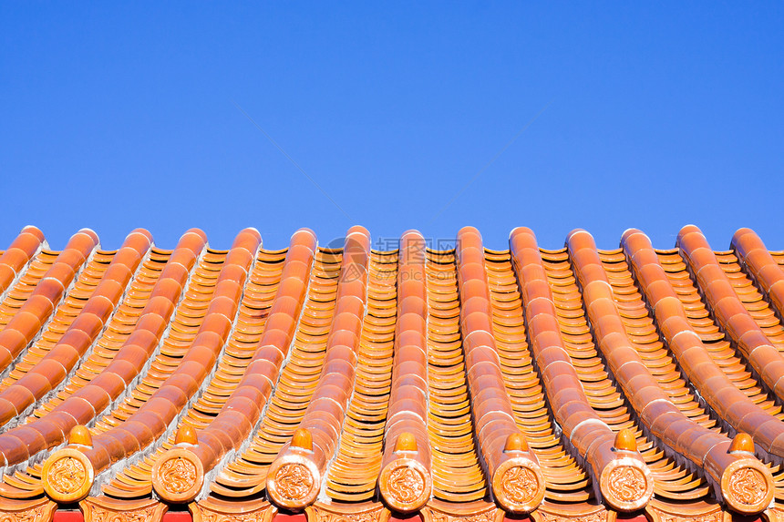 中国屋顶瓷砖天空晴天情调红色橙子寺庙房子蓝色异国阳光图片
