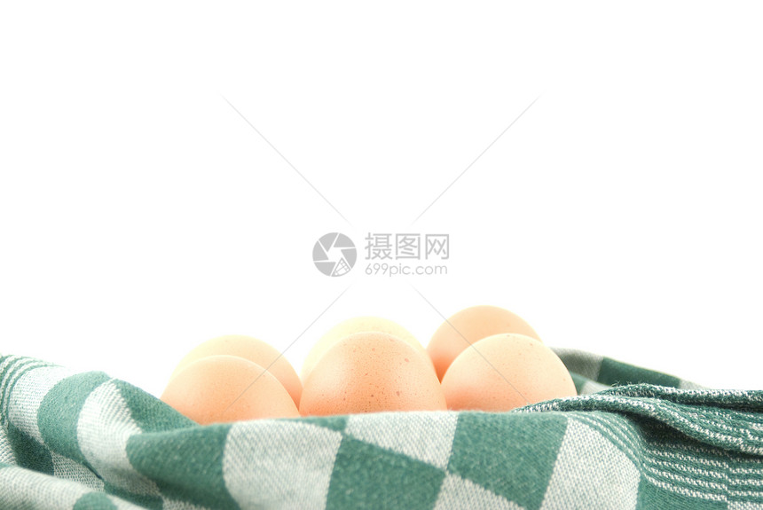 鸡蛋在卵篮中白色绿色毛巾食物野餐图片