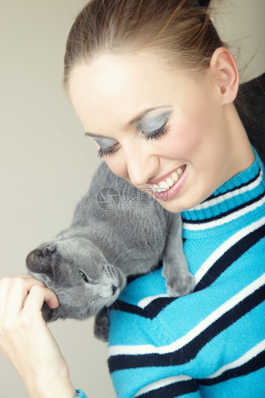 女士和猫咪女性小猫食肉兽医亲热乐趣友谊猫科动物眼睛动物图片