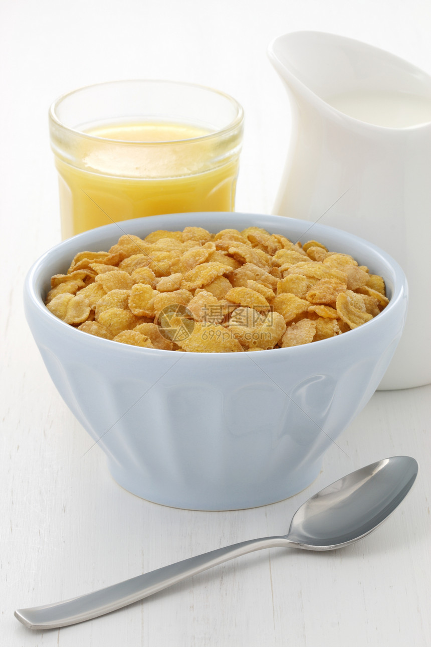 美味的玉米片早餐食物橙汁谷物麦片奶制品玉米勺子产品粮食纤维图片