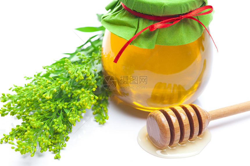 紧紧粘在白色的蜂蜜和罐子上药品树叶早餐洋甘菊治疗丝带甜点糖浆生活金子图片
