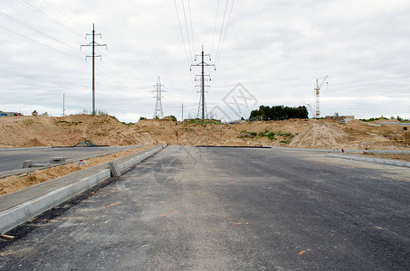 公路铺沥青路建设工地高清图片