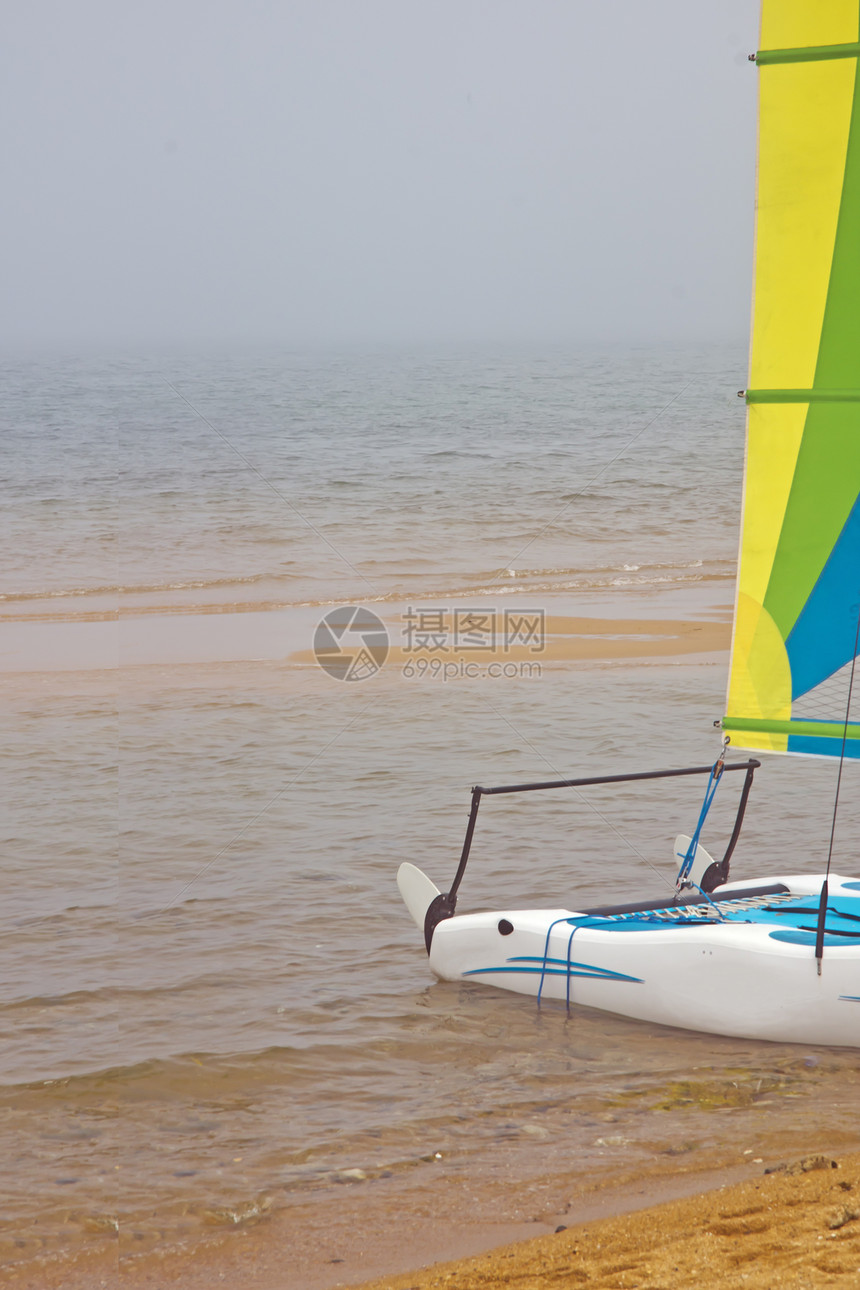 海沙滩临时背景图像天空旅行太阳渔船沙滩旅游蓝色季节排球雨伞图片