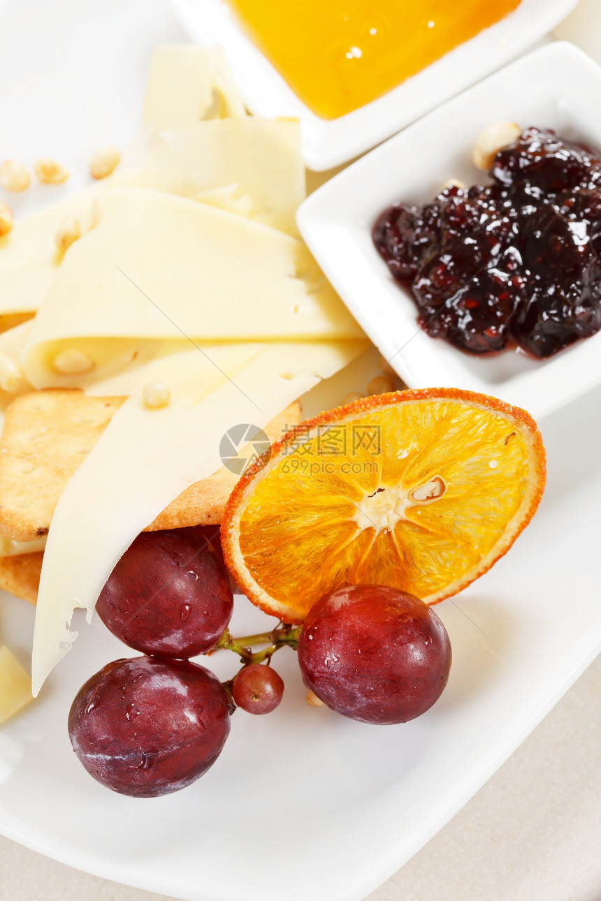 奶酪板食物甜点核桃蜂蜜橙子产品蓝色坚果小吃饼干图片