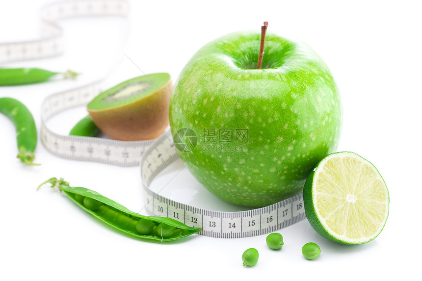 以白色隔离的测量磁带和测量磁带统治者甜点尺寸生活奇异果维生素植物权重水果蔬菜图片