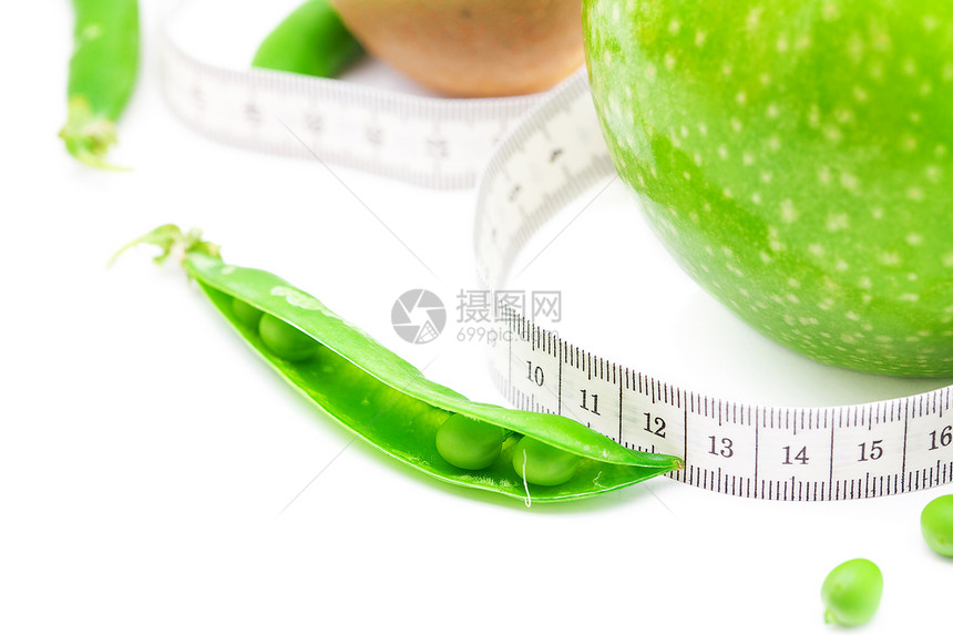 以白色隔离的测量磁带和测量磁带公制维生素奇异果饮食植物蔬菜权重生活甜点裁缝图片