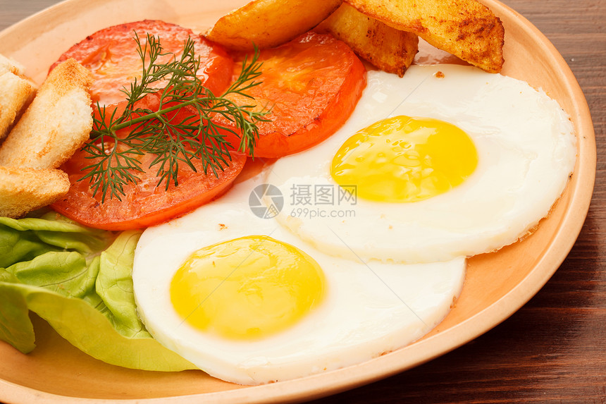 带蔬菜的炒鸡蛋草本植物午餐橙子食物土豆盘子营养油炸早餐美食图片