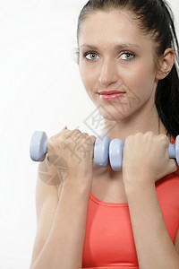 工作妇女腹肌头发成人女性快乐力量训练健身房权重肌肉背景图片