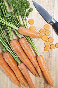 切碎板上的胡萝卜烹饪蔬菜食物切菜板背景图片