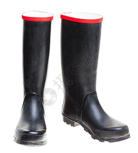 惠灵顿斯内饰静物橡胶鞋类黑色橡皮靴子背景图片