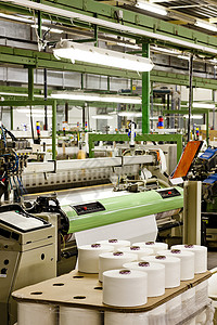 纺织机面料技术机械化制造机器工业纺织品机械纺织筒管背景图片