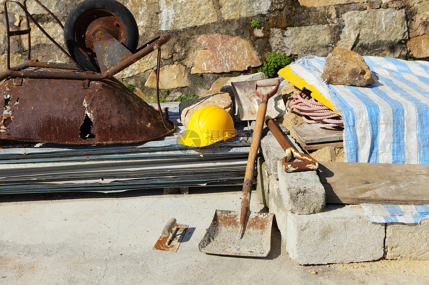 建筑设备工作职业瓦工石头工具啄木鸟石匠工作服房子石工图片