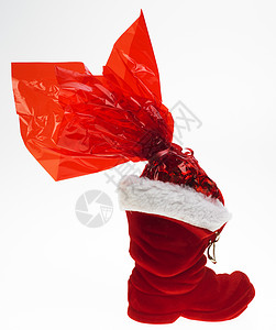圣诞节靴子静物展示纹饰传统装饰品庆祝包装活动点缀庆典背景图片