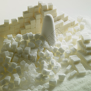 含糖尚可食糖内饰食物肿块食品面包营养蔗糖白色块糖静物背景图片
