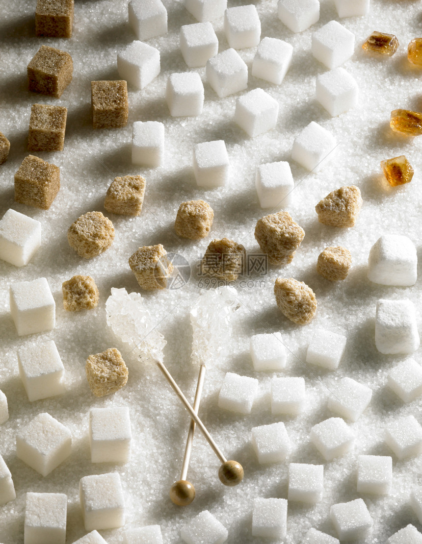 含糖尚可食糖食物白色静物肿块块糖棕色糖果内饰营养蔗糖图片