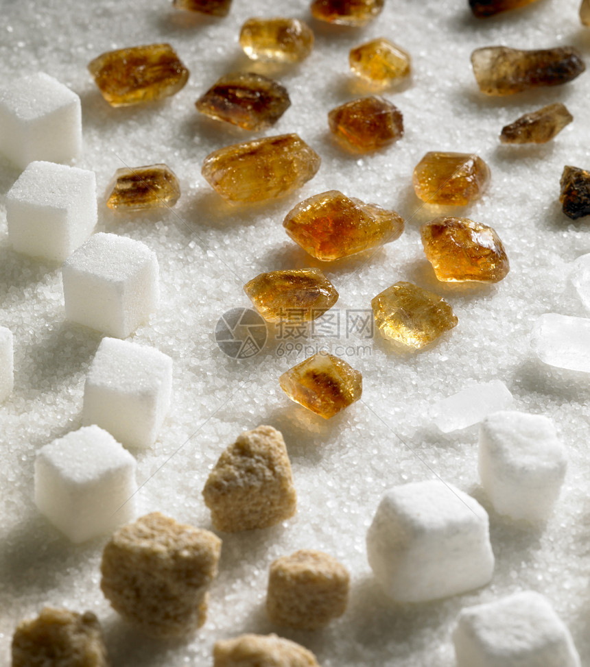 含糖尚可食糖食品食物棕色营养块糖静物糖果蔗糖内饰白色图片