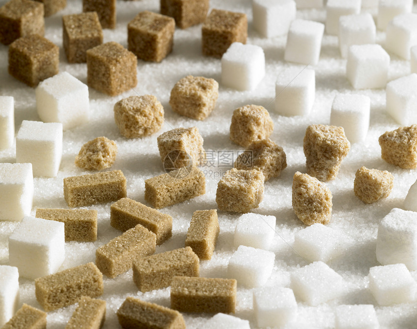 含糖尚可食糖棕色食品块糖内饰蔗糖肿块食物白色营养静物图片