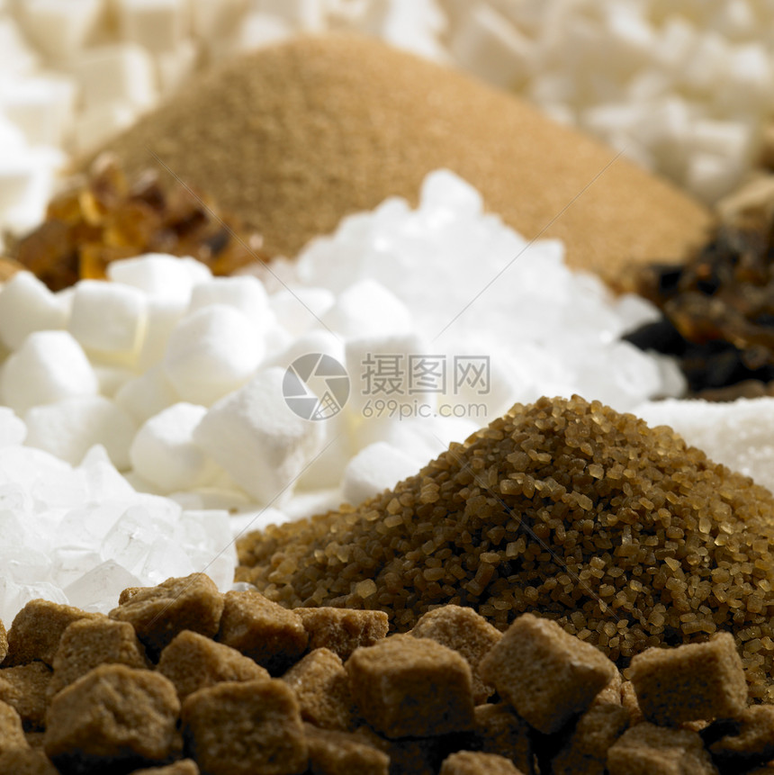 含糖尚可食糖食品蔗糖营养静物肿块糖果白色棕色食物块糖图片